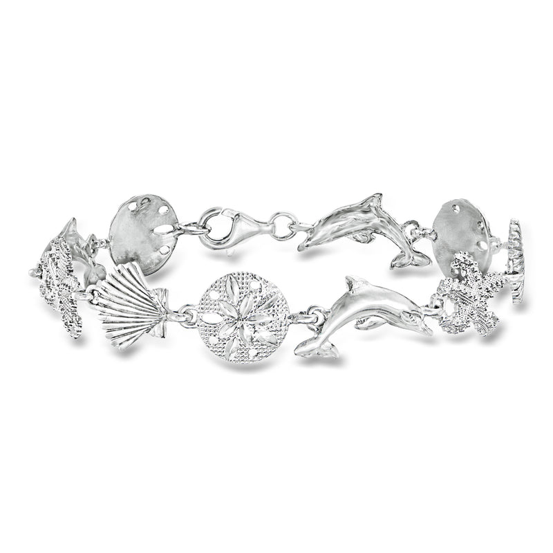 Sterling silver sea-life charm bracelet with shells, starfish, dolphins, and a clasp