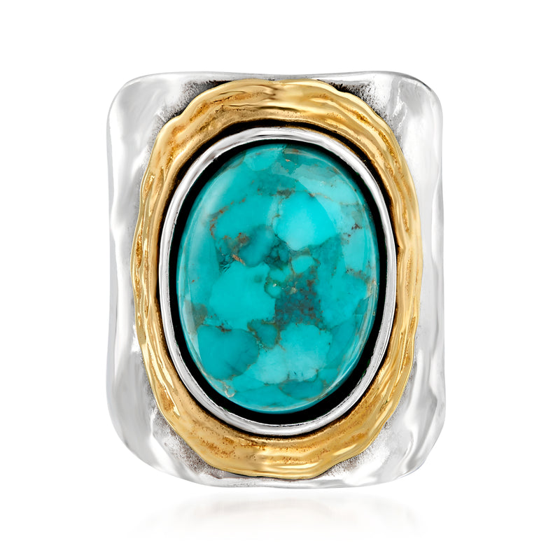 Oval turquoise ring with sterling silver bezel and 14kt yellow gold wire frame