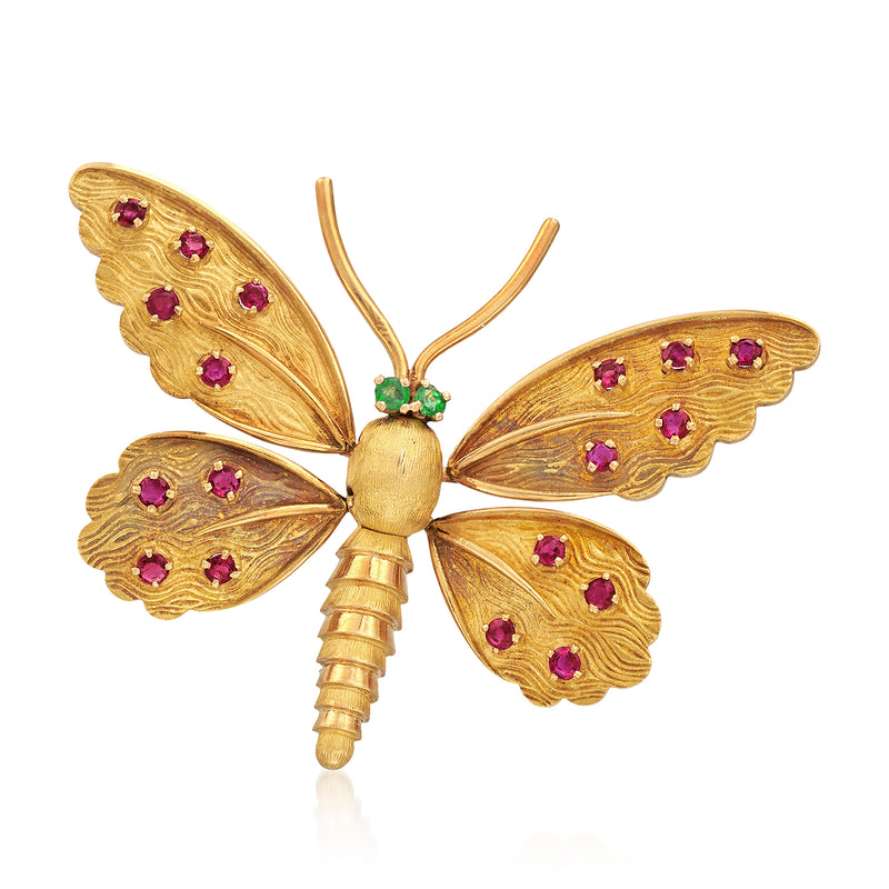 Vintage butterfly pin in 18kt yellow gold with ruby gemstone wings and emerald eyes