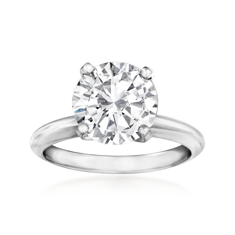 Platinum solitaire engagement ring with large round diamond in prong setting