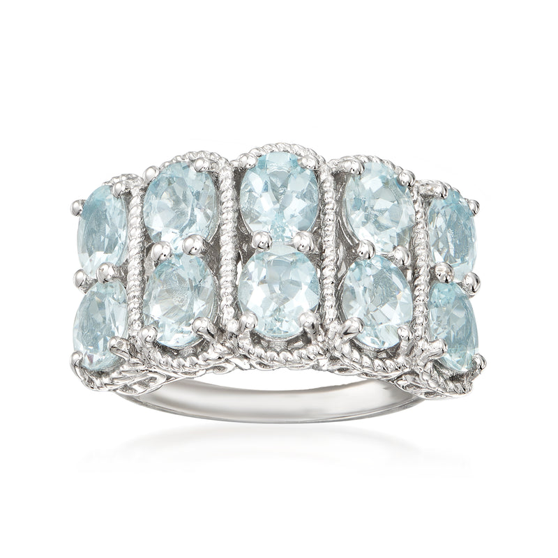 Sterling silver aquamarine ring with oval blue stones in a row, ornate prong setting