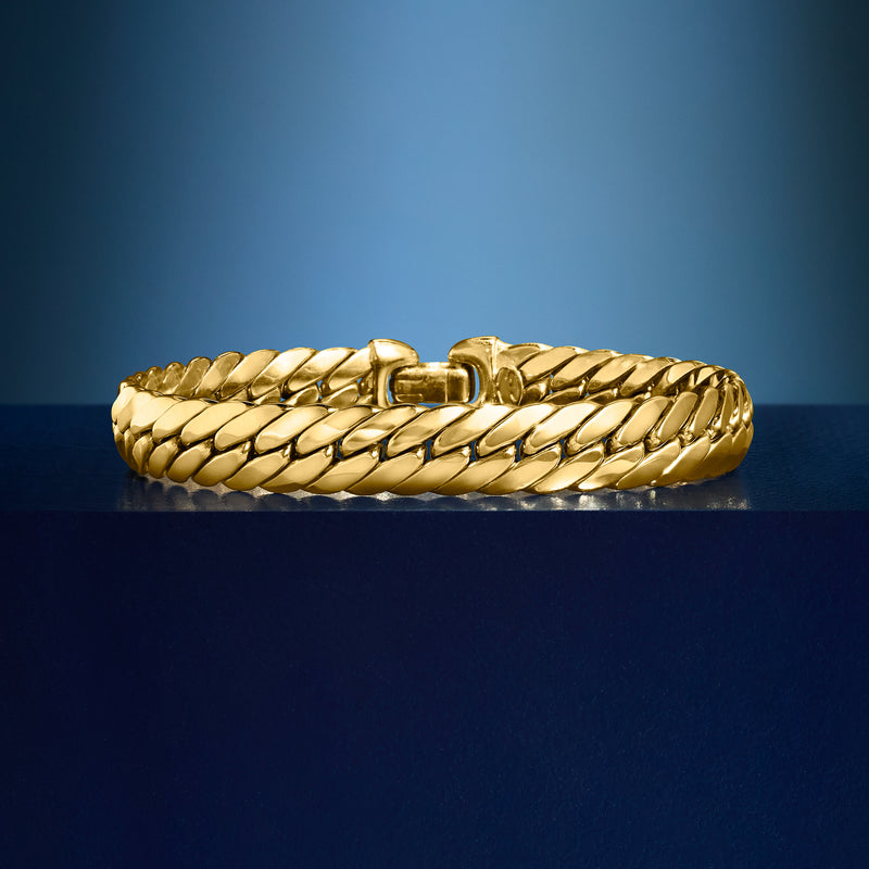 14kt yellow gold Cuban-link bracelet shown in profile, smooth polished chain links