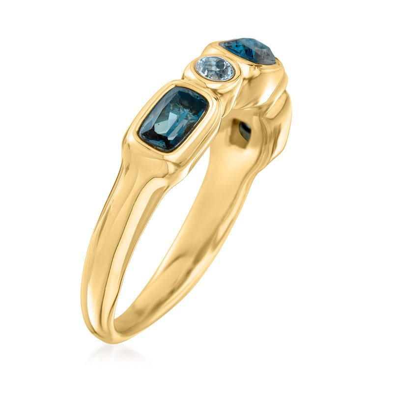 14kt yellow gold topaz ring with two dark blue cushion stones and round accents