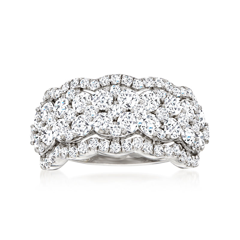 Scalloped diamond cluster ring with glittering stones on 14k white gold band