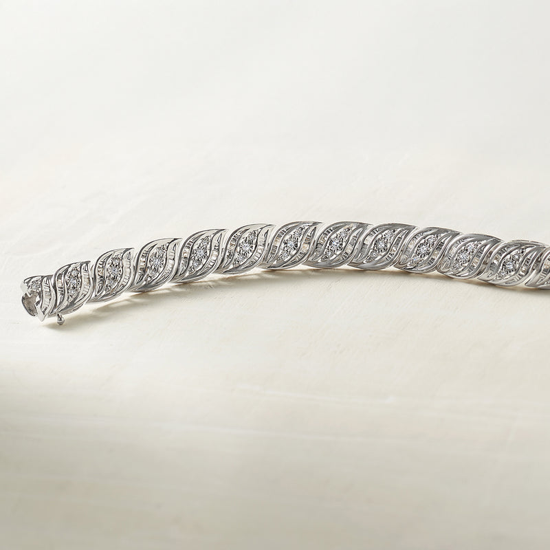 Sterling silver diamond bracelet with leaf-shaped linked settings