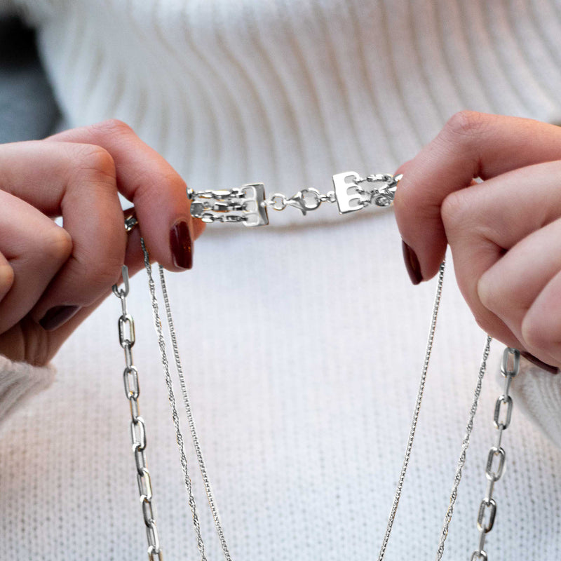 Sterling silver clasp with hinged connector, chain extender, and circular links