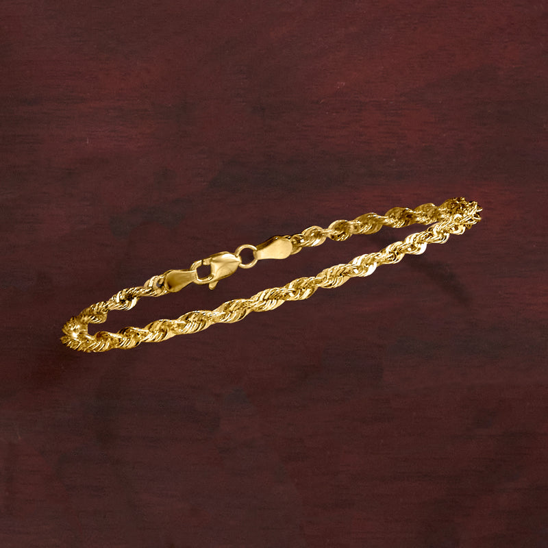 14kt yellow gold rope-chain bracelet, angled view with oval clasp