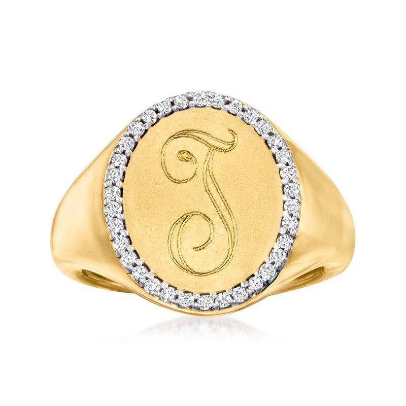 Personalized signet pinky ring in 14kt yellow gold with diamond halo and engraved monogram