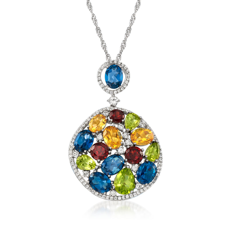 Sterling silver multi-gemstone pendant necklace with round blue stone and teardrop halo