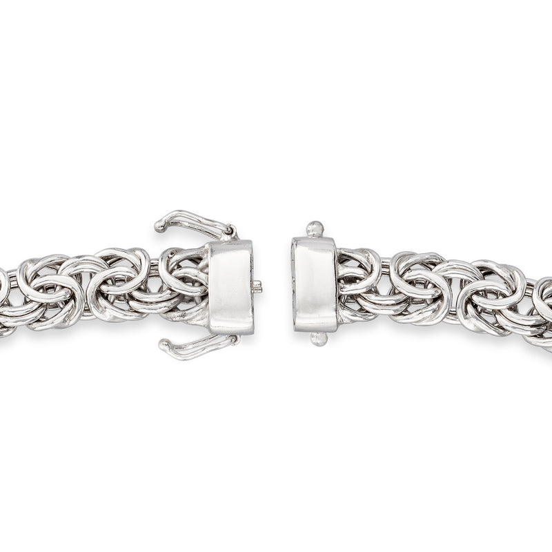 Sterling silver bracelet close-up with magnetic clasp plates and interlocking chain