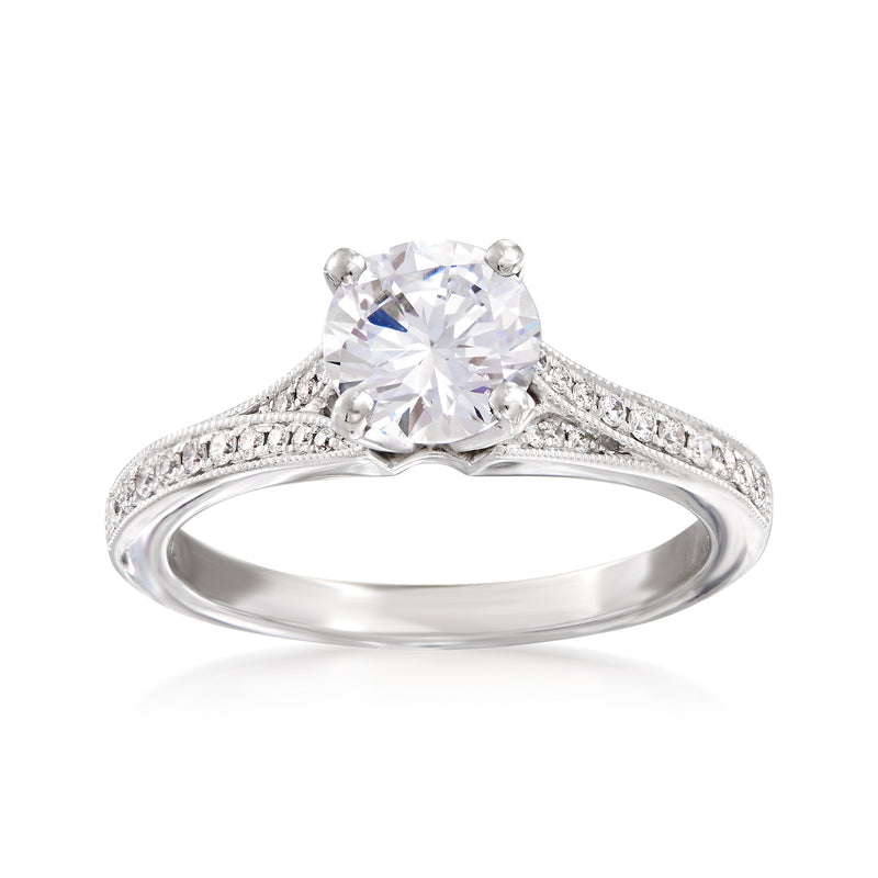 14kt white gold diamond engagement ring setting with round center stone and pavé band
