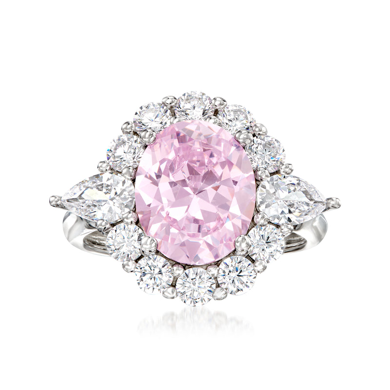 Sterling silver ring with oval pink simulated gem and clear cubic zirconia halo