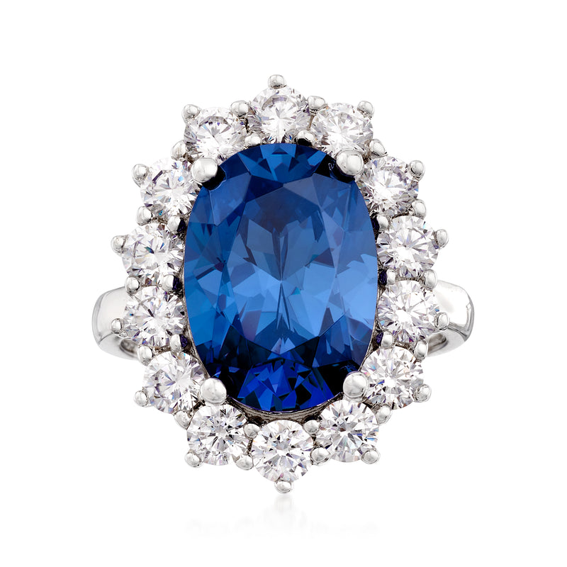 Sterling silver oval sapphire-look ring with blue center stone and clear CZ halo