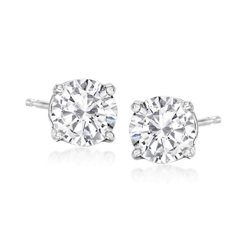 Round diamond stud earrings, prong-set clear stones on platinum posts