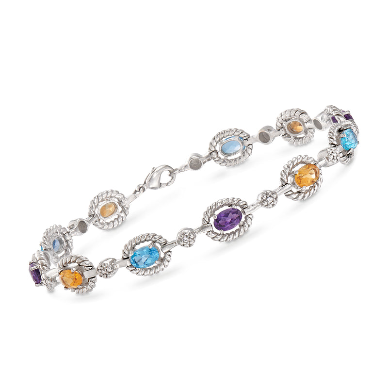Sterling silver multi-gem bracelet with round and oval colorful gemstones in bezel settings