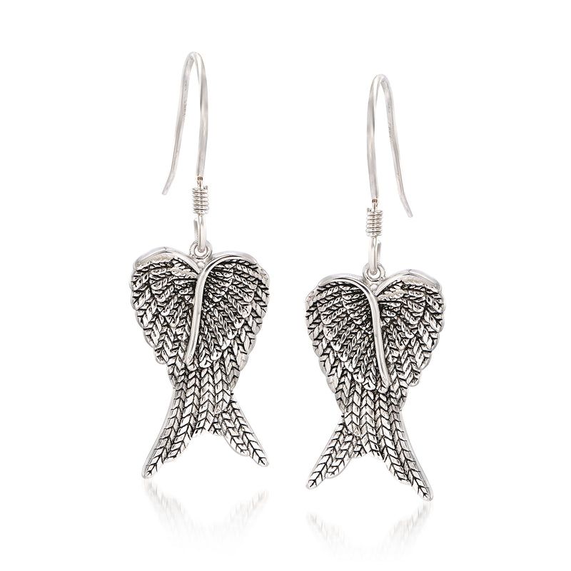 Sterling silver angel wing drop earrings with textured wings and French earwires