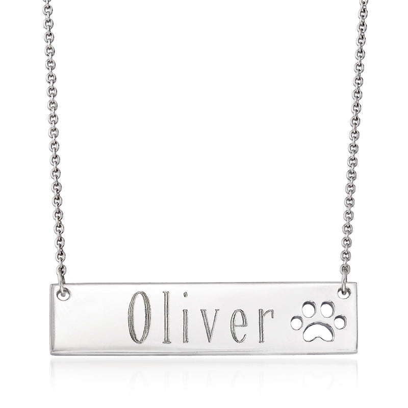Sterling silver personalized name bar necklace with engraved Oliver and paw-print charm