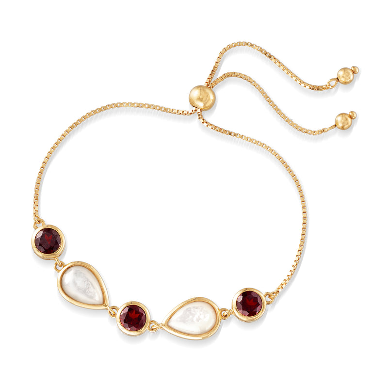 Gold bolo bracelet with oval mother-of-pearl links and round red garnet stones