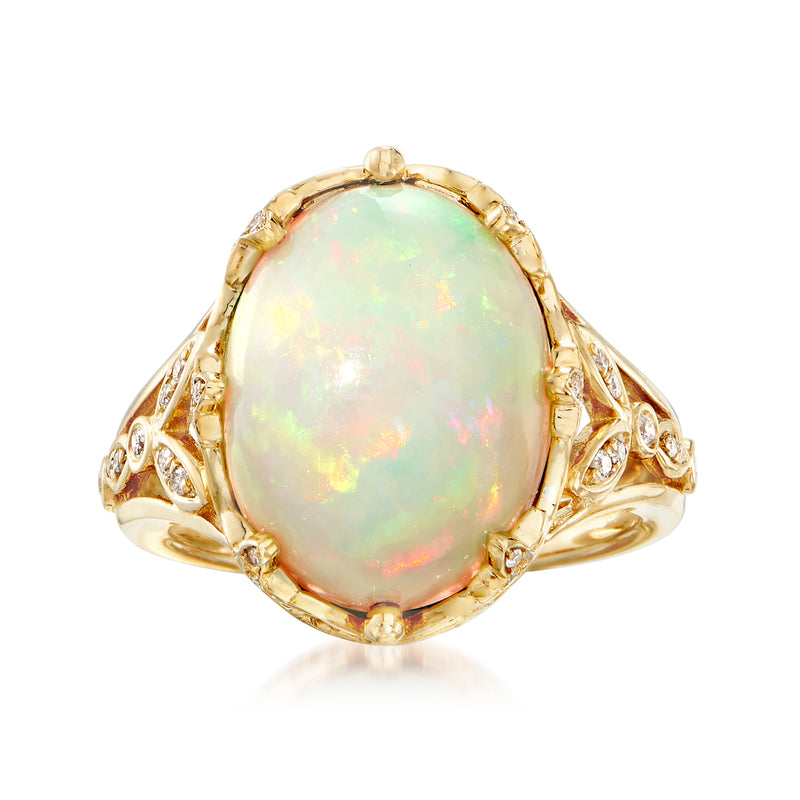 14kt yellow gold opal and diamond oval ring with halo and filigree shoulders
