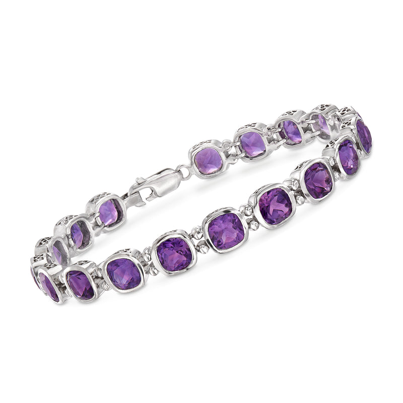 Sterling silver bracelet with oval purple amethyst gemstones in prong settings