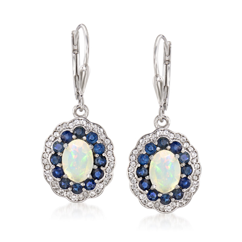 Sterling silver leverback drop earrings with opal white center and blue sapphire halo