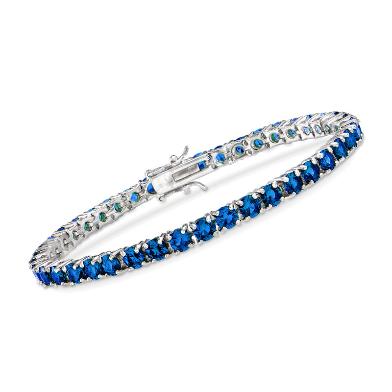 Sterling silver tennis bracelet with blue simulated sapphire stones and toggle clasp