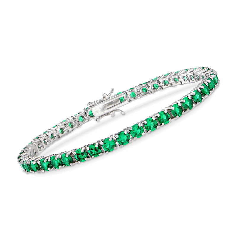 Sterling silver tennis bracelet with oval green simulated emerald stones