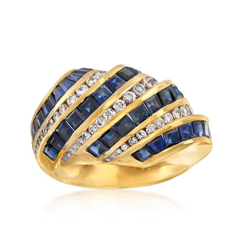 18k yellow gold diagonal row ring with blue sapphire baguettes and diamond accents