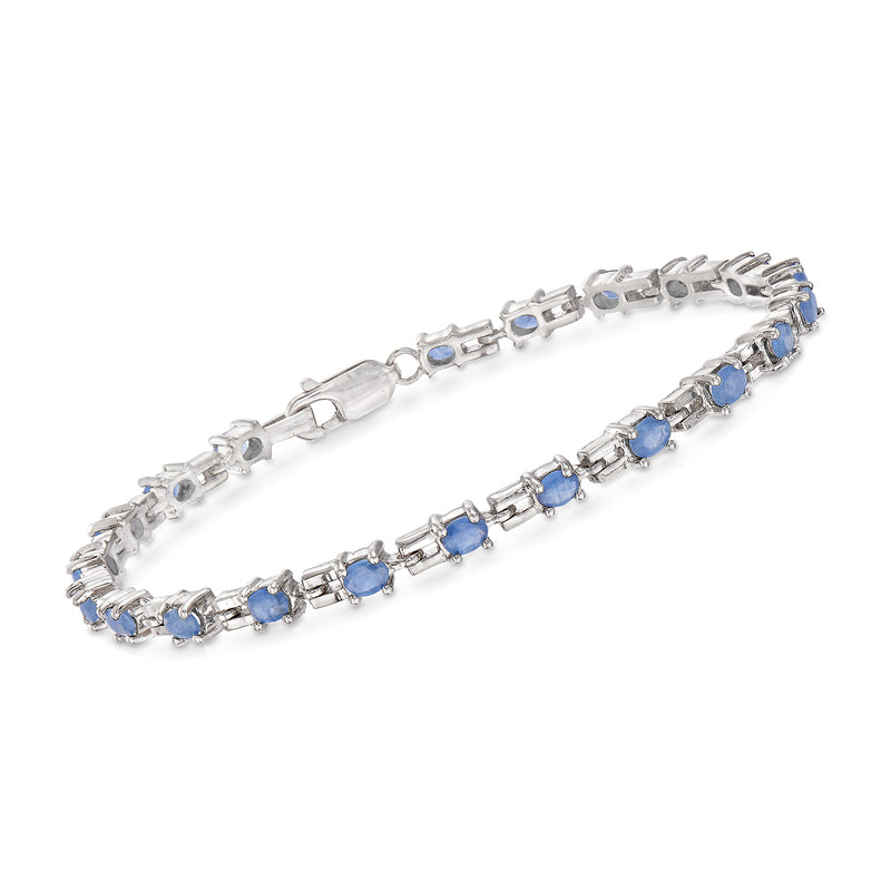 Sterling silver link bracelet with blue sapphire-cut stones in row settings