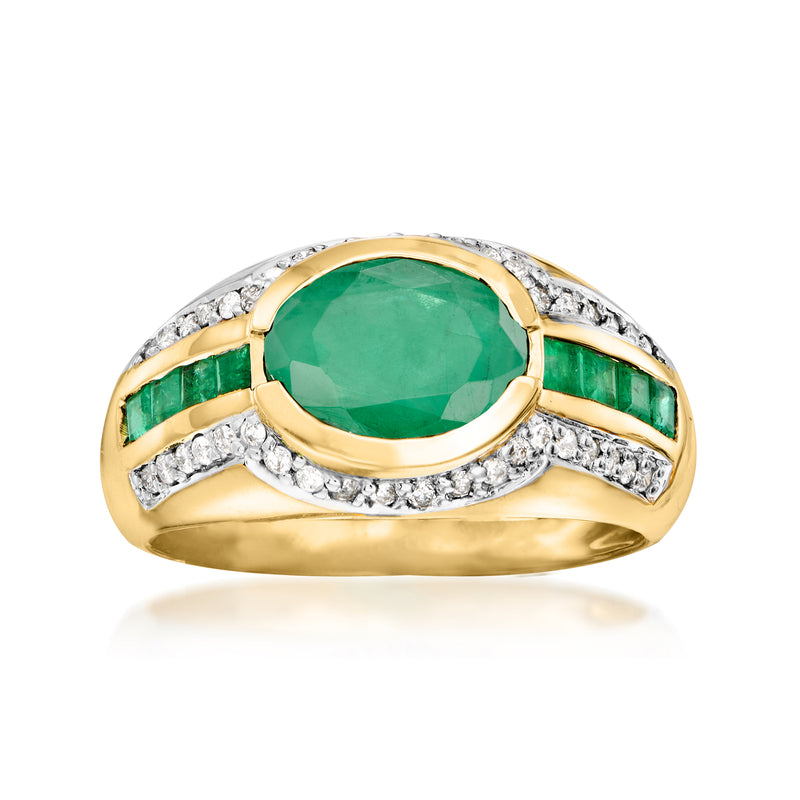 14kt yellow gold ring with oval green emerald, diamond halo, green baguette sides
