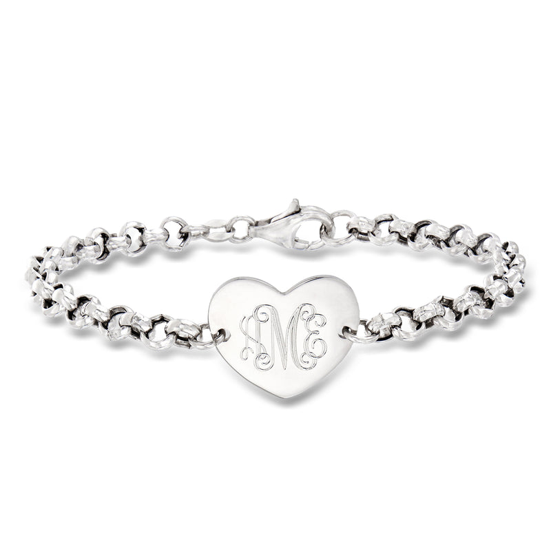 Sterling silver heart charm bracelet with engraved monogram initials and link chain.