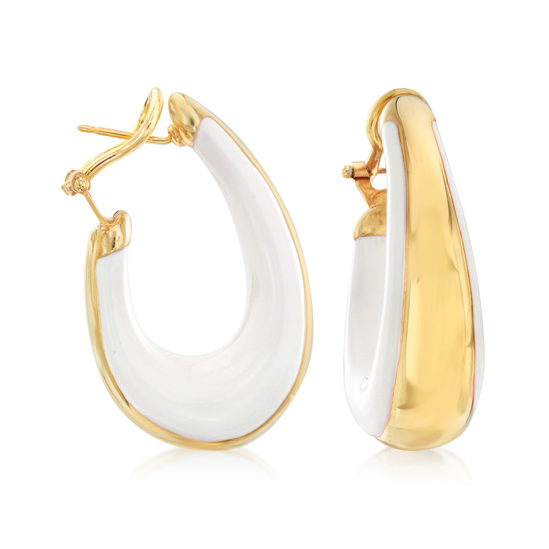 Gold-tone hoop earrings with white enamel, small charm and hinged clasp