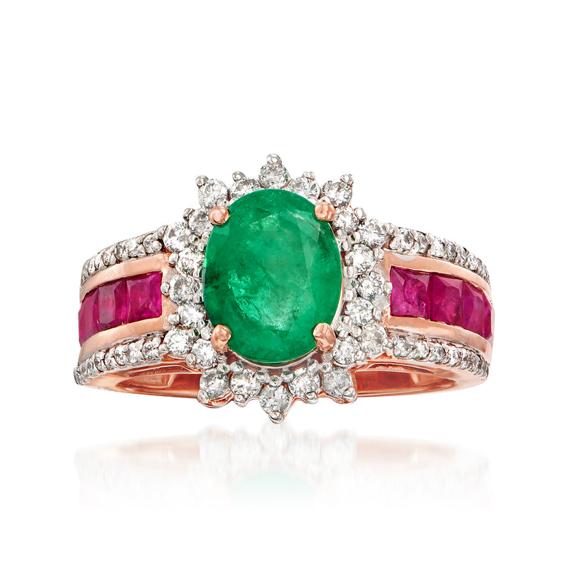 14kt rose gold ring with oval emerald center, diamond halo, ruby side stones