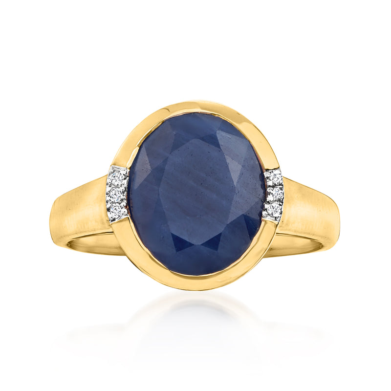 14kt yellow gold sapphire ring with deep blue center stone and diamond side accents
