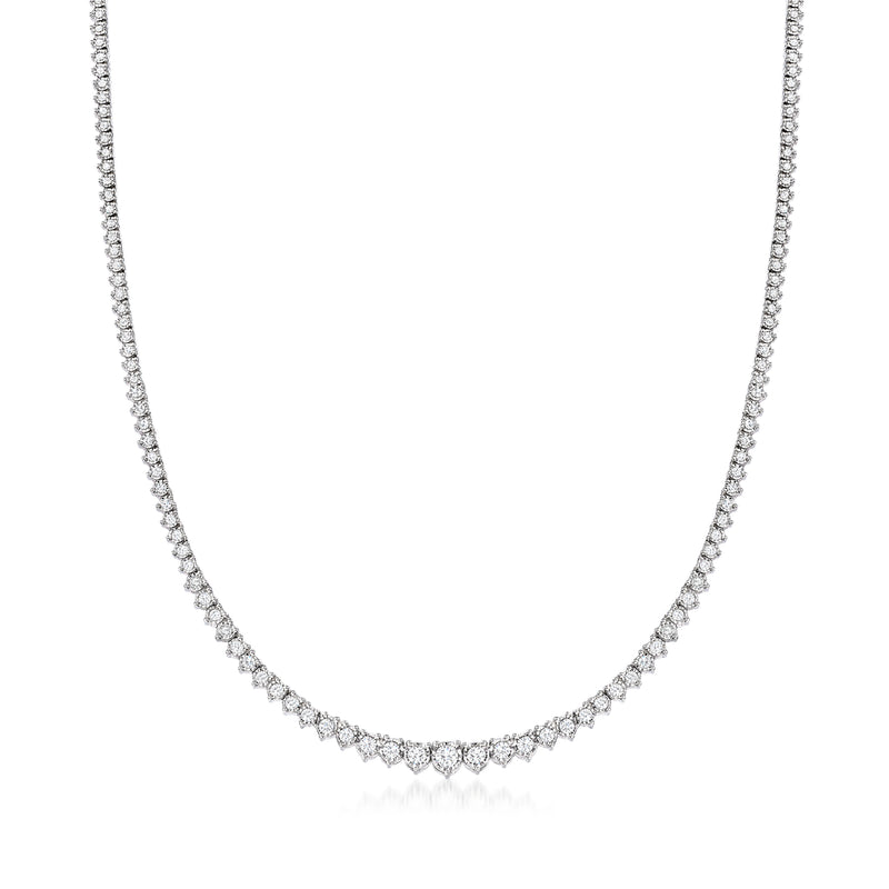 Sterling silver diamond tennis necklace with small round stones along a curved chain