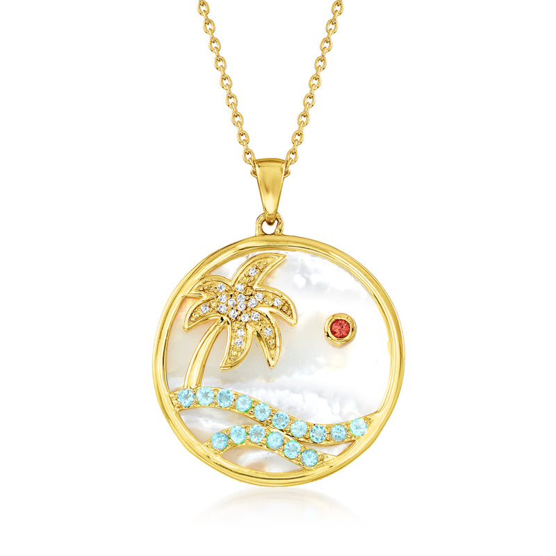 Gold pendant necklace with round mother-of-pearl disc, palm tree, blue stones, orange gem