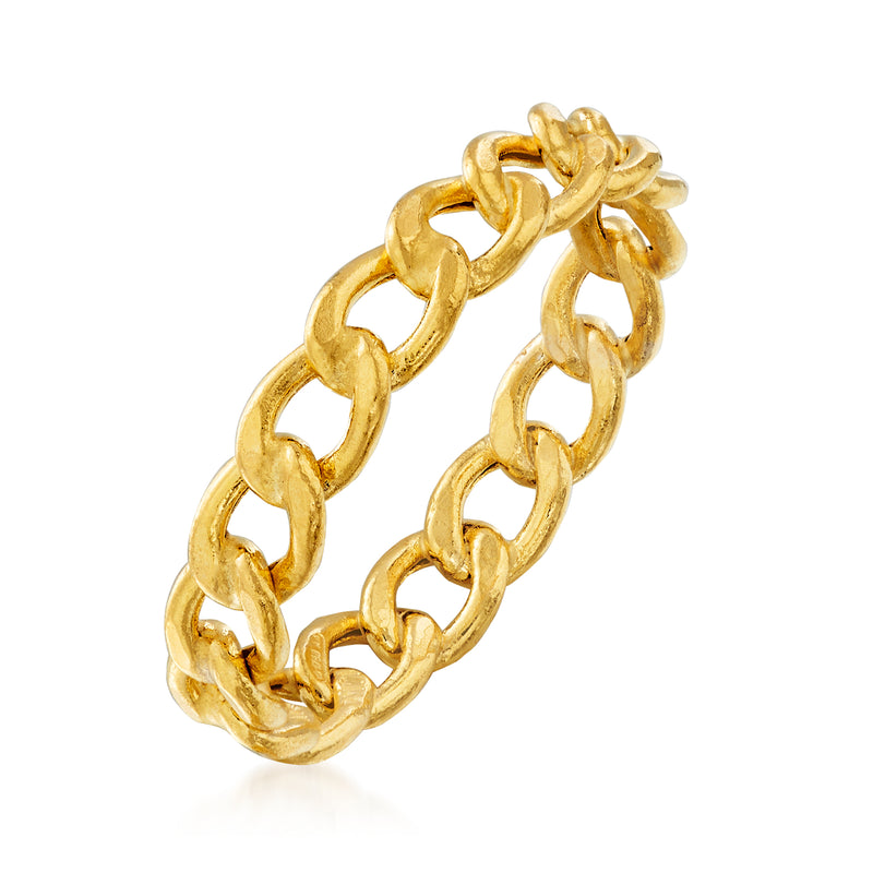 Yellow gold curb-link ring with thick interlocking oval links, side view.