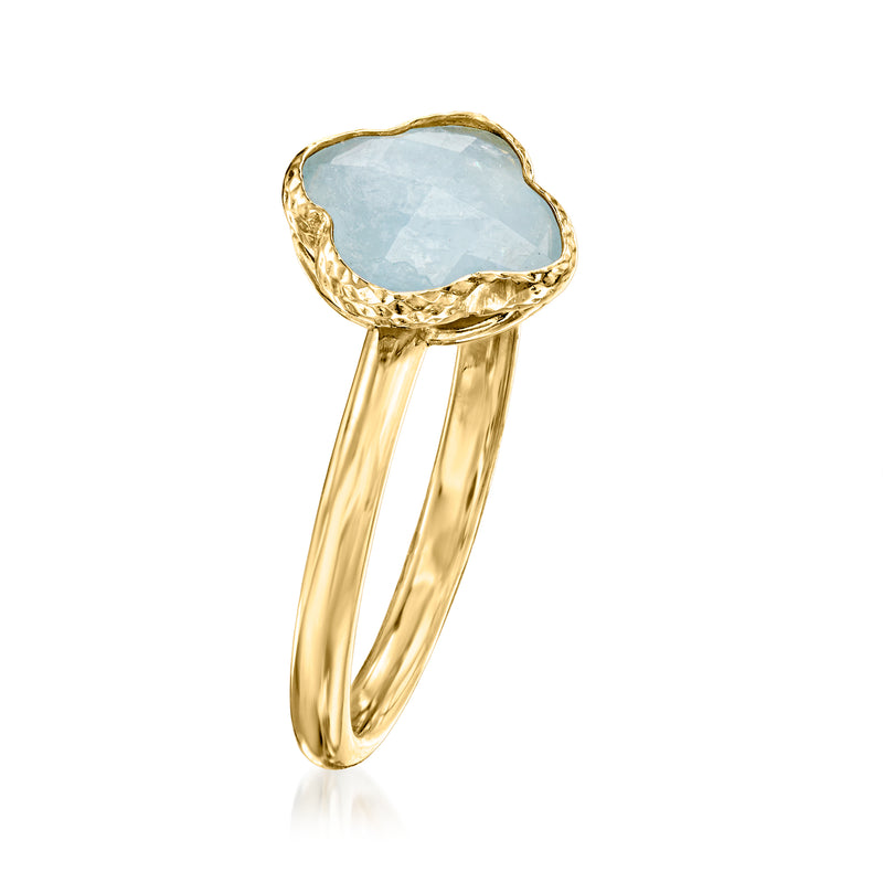 14kt yellow gold clover ring with prong-set light aquamarine stone, side view