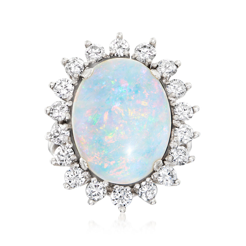 14kt white gold ring with oval opal center and round diamond halo