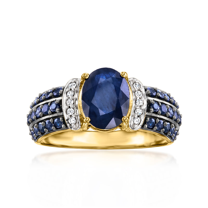 14kt yellow gold sapphire ring with diamonds and oval blue center stone