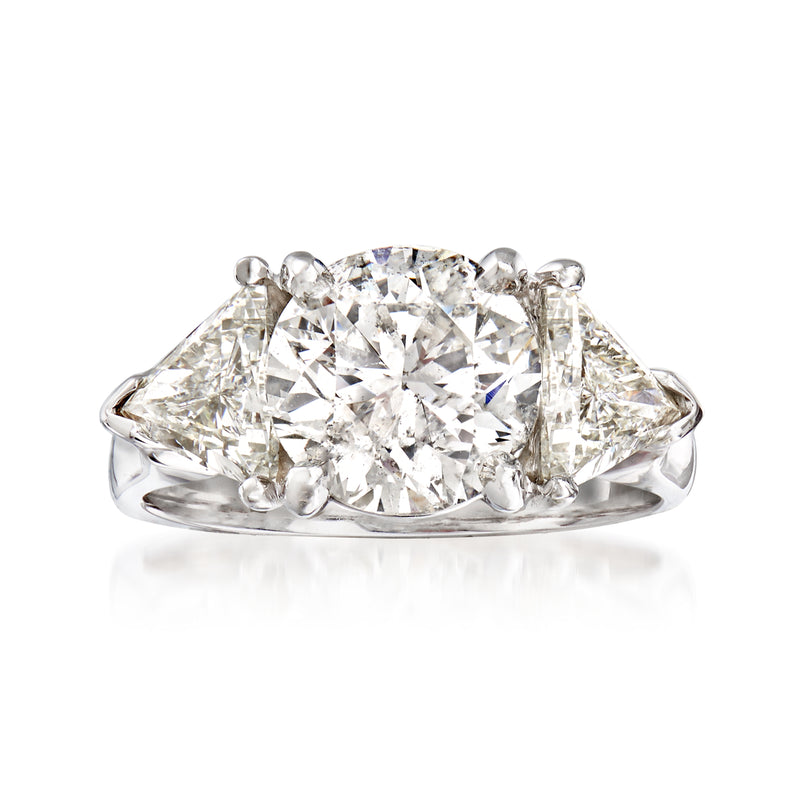 14kt white gold diamond ring with oval center stone and side diamonds