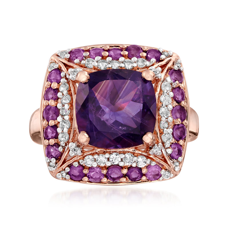 Rose gold ring with large purple amethyst center, amethyst side stones, white accents