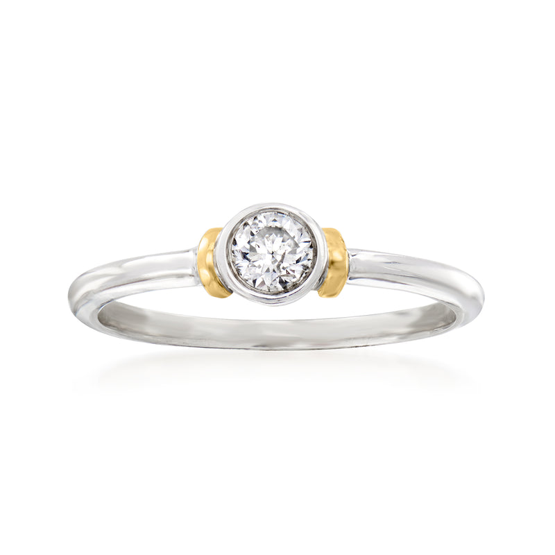 Bezel-set round diamond ring with sterling silver band and 14kt yellow gold accents