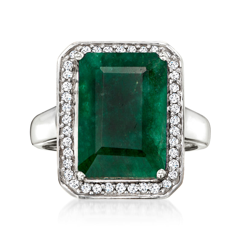 Sterling silver ring with emerald-green emerald-cut center and diamond halo