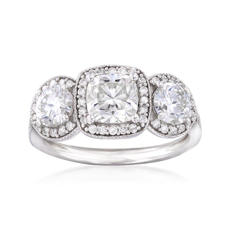 14k white gold three-stone engagement ring with center moissanite and diamond halos