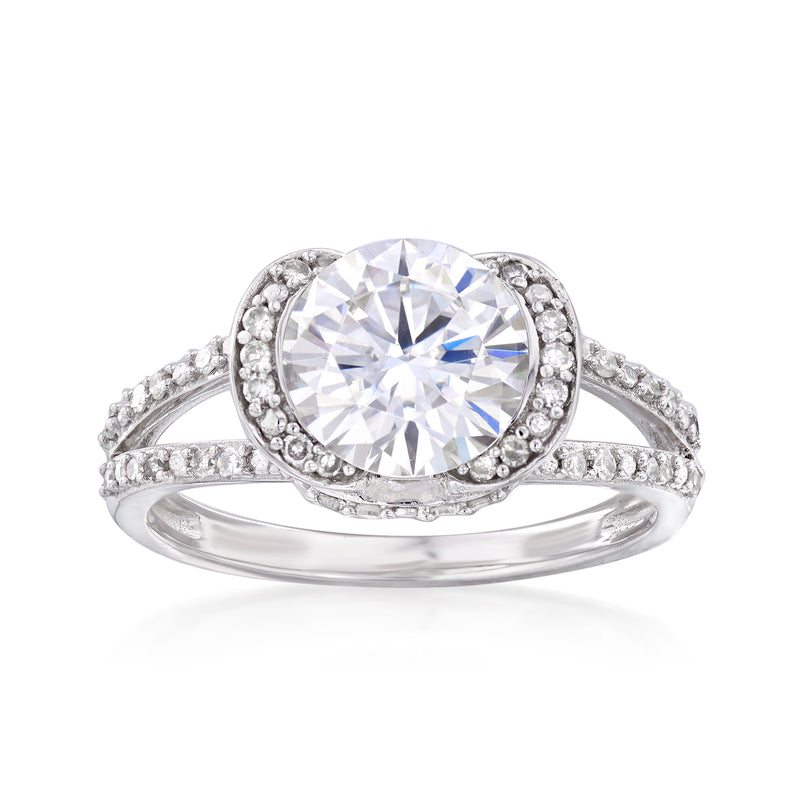 14kt white gold engagement ring with round moissanite solitaire and diamond halo