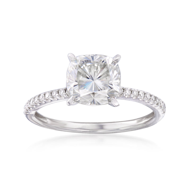 14kt white gold engagement ring with large round center stone and small side stones