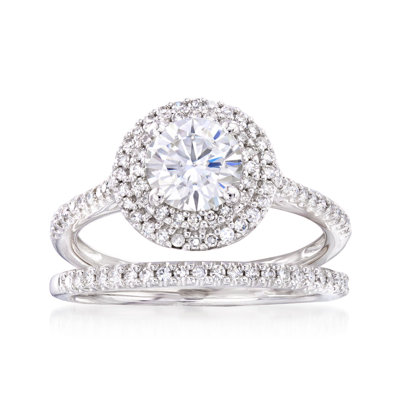 14kt white gold engagement ring with round moissanite center and diamond halo