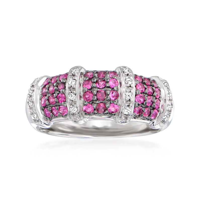 Pink sapphire dome ring in 14kt white gold with diamond accents, halo-like side rows