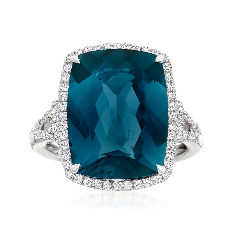London blue topaz and diamond ring with cushion-cut blue stone, diamond halo, white gold